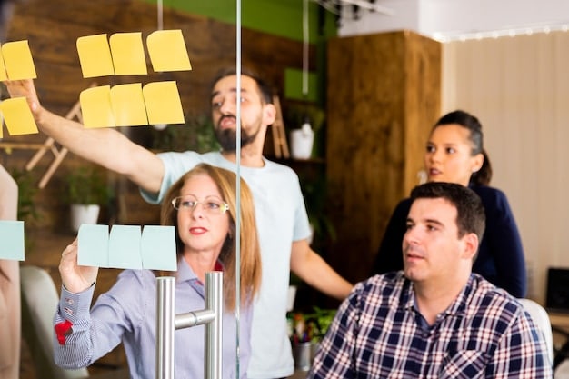 A group of young professionals brainstorming ideas in a modern co-working space, using sticky notes on a whiteboard and collaborating enthusiastically. The image should convey creativity, teamwork, and a dynamic atmosphere.