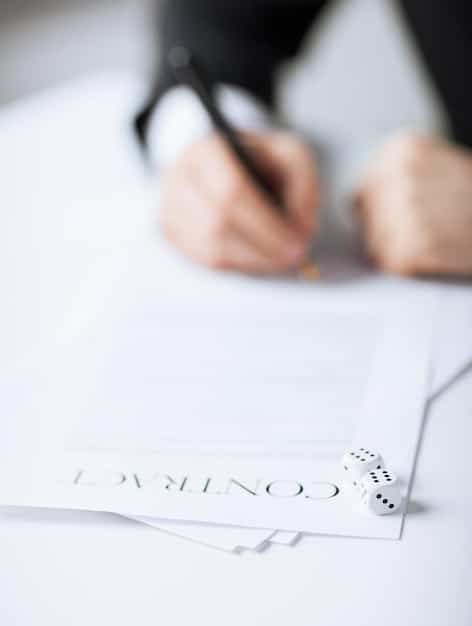 A close-up of a hand signing a lease agreement with a pen. The background is blurred, focusing on the moment of legal commitment.