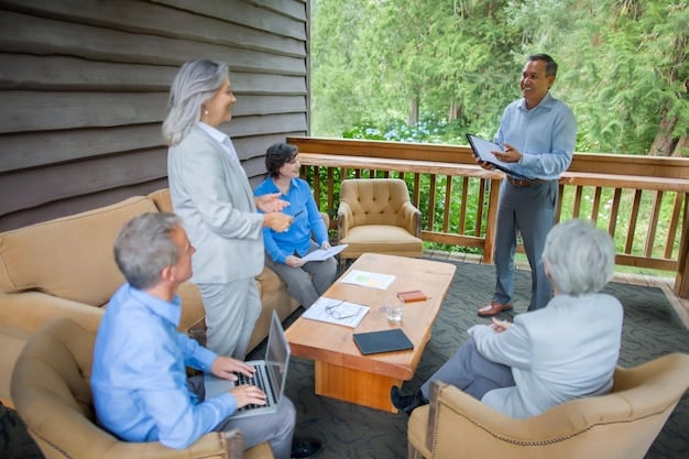 A case manager meeting with a resident in their supportive housing apartment. They are reviewing a plan for achieving the resident's personal goals, such as finding employment or improving their health.