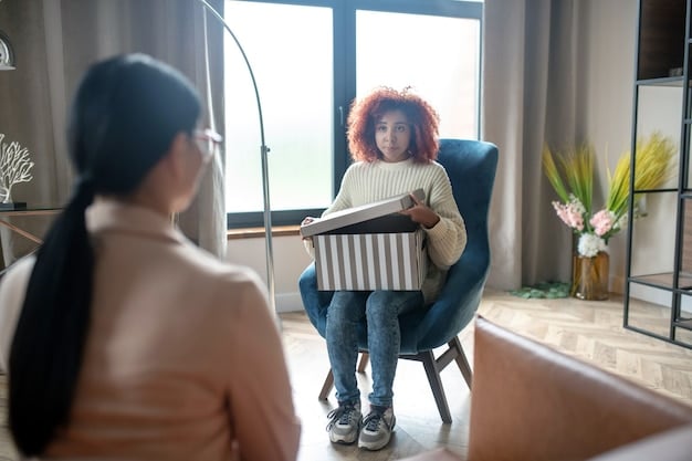 A person sitting in a comfortable chair, talking to a therapist in a warm and inviting office setting, with natural light streaming through the window, suggesting a safe and supportive environment for discussing personal challenges.