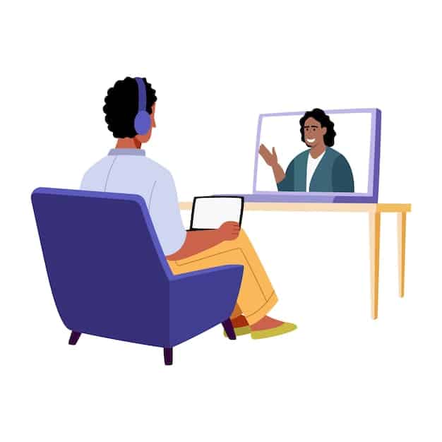 A person in the middle of a video call with their therapist, both smiling and nodding.