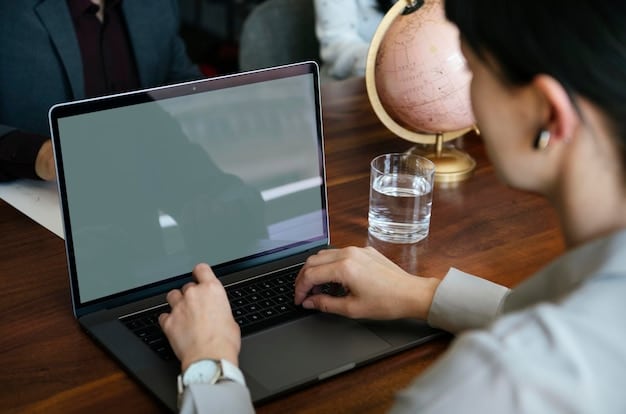 A close-up of a person's hands using a laptop to research community resources. The screen shows a directory listing with details about an organization, including accreditation seals, contact information, and user reviews.