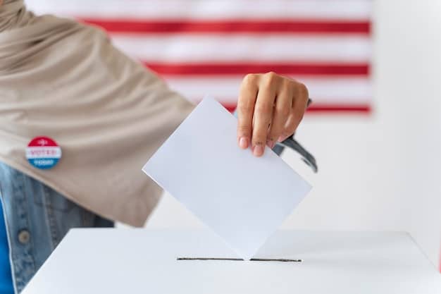 A close-up shot of a hand casting a ballot in a voting booth, with a blurred background of other voters and election officials.