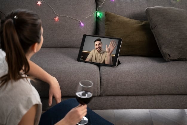 A person is sitting comfortably on their couch, using a tablet for a telehealth consultation. The lighting is soft, and the individual appears relaxed and engaged in the conversation with the healthcare provider on the screen.