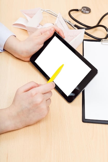 A close-up of hands using a tablet to compare different health insurance plans, with charts and graphs in the background illustrating premiums, deductibles, and coverage options. The focus is on informed decision-making and data analysis.